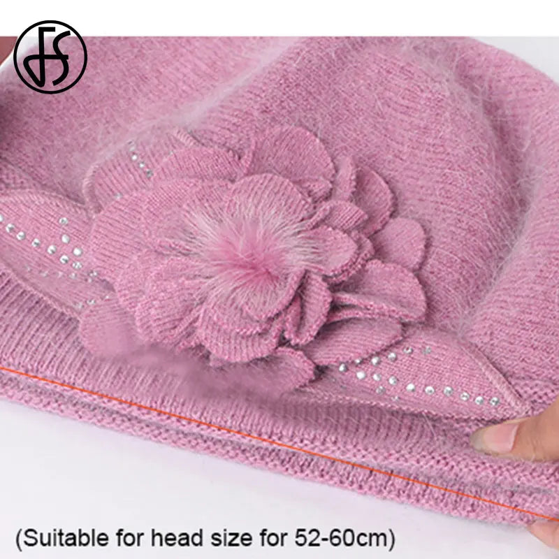 Pink headscarf with floral design and embellishments on a white background