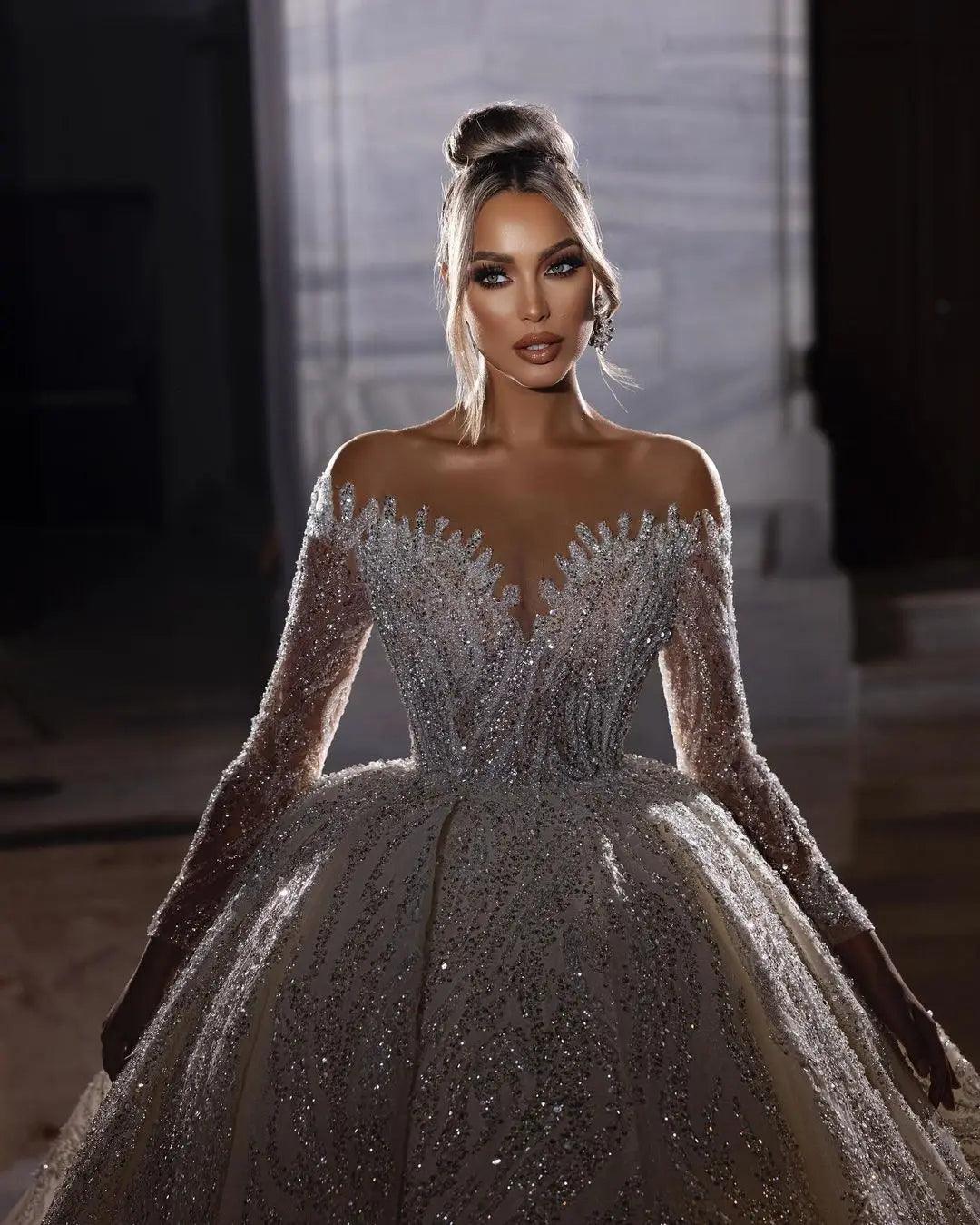 Luxury Strapless Princess Wedding Gown with Beaded Illusion Sleeves and Deep V-Neck