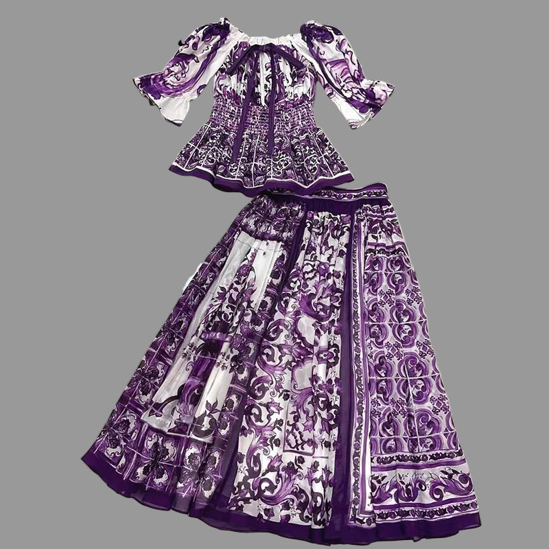 Purple and white patterned dress set on a tiled floor with 'Seifrmann' branding.