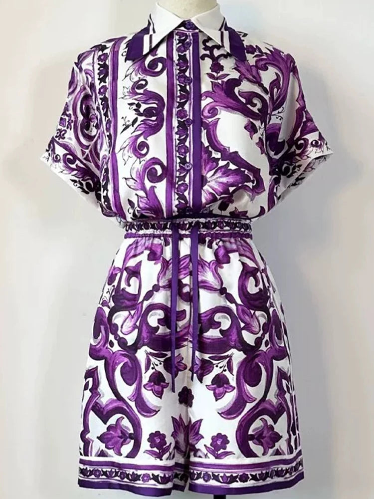 Purple and White patterned dress on a mannequin against a White background