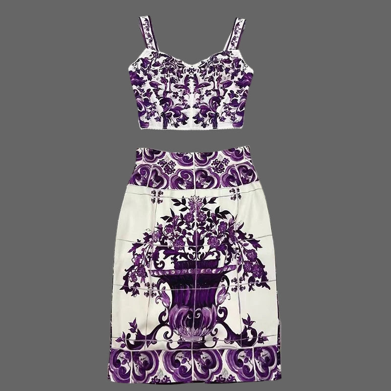 Purple and white floral patterned top and skirt set on a gray tiled floor with 'Seifermann' branding.