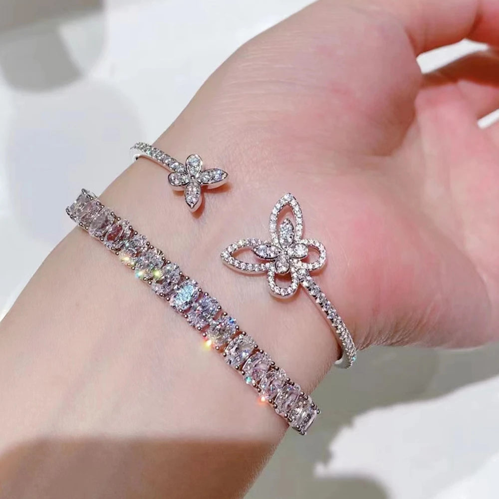 Silver bracelet with clear stones on a White background, featuring the Wuiha brand.