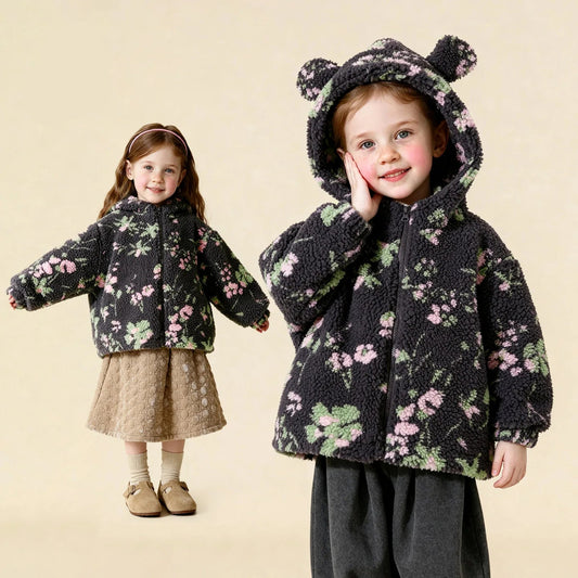 Child wearing a brown teddy bear patterned coat with another child in a similar outfit on a beige background, featuring the Amila brand. - HER SHOP®