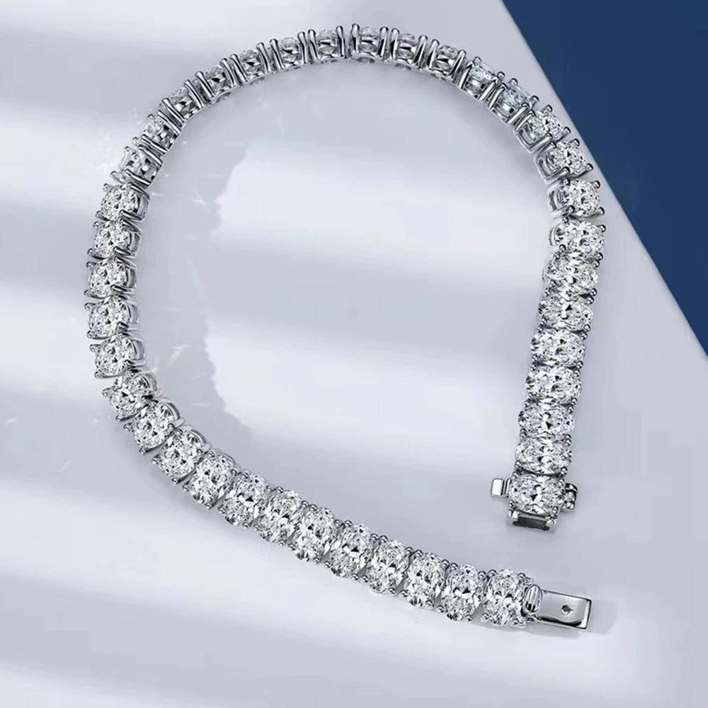 Silver bracelet with clear stones on a White background, featuring the Wuiha brand.