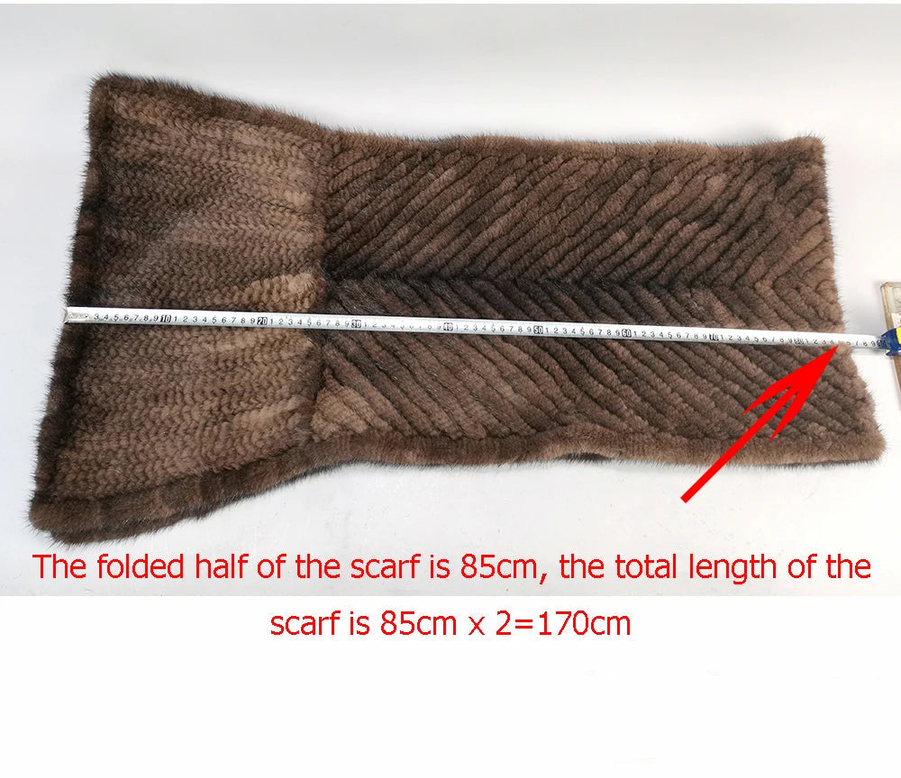 Brown scarf with a measuring tape indicating its length on a white background