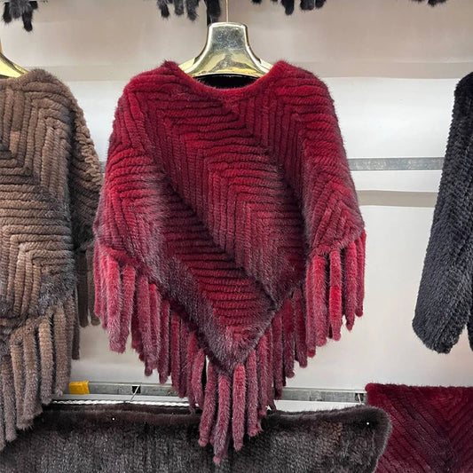 Brown knitted poncho with fringe on a hanger against a white background - HER SHOP