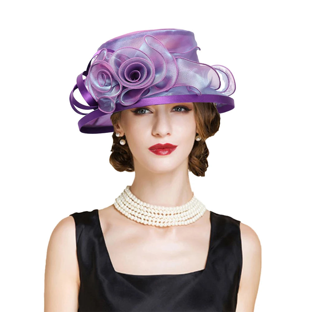 Woman wearing a purple decorative hat with flowers on a white background