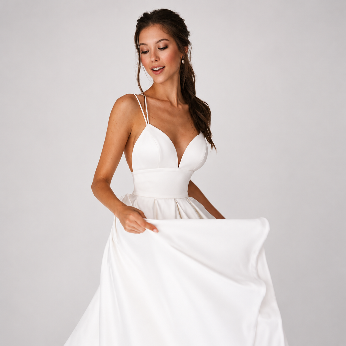 White satin short bridal gown with clean modern styling