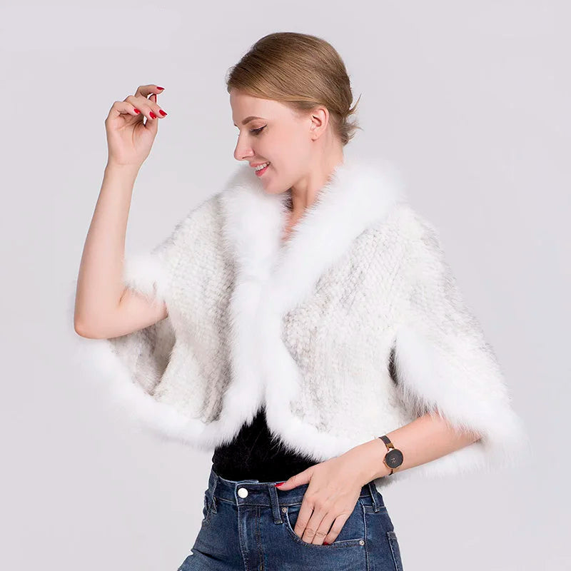 Woman wearing a white fur vest on a plain background with 'MS.MinShu' branding.