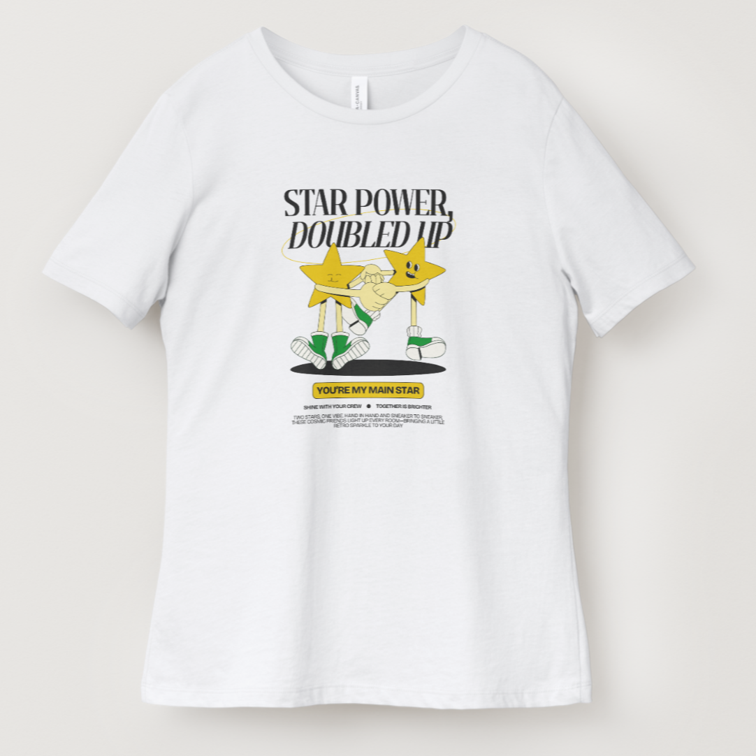 White t-shirt with cartoon design and text on a light gray background