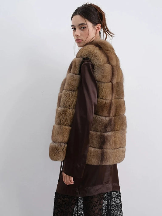 Woman wearing a brown fur vest over a dark dress with lace details on a white background - HER SHOP