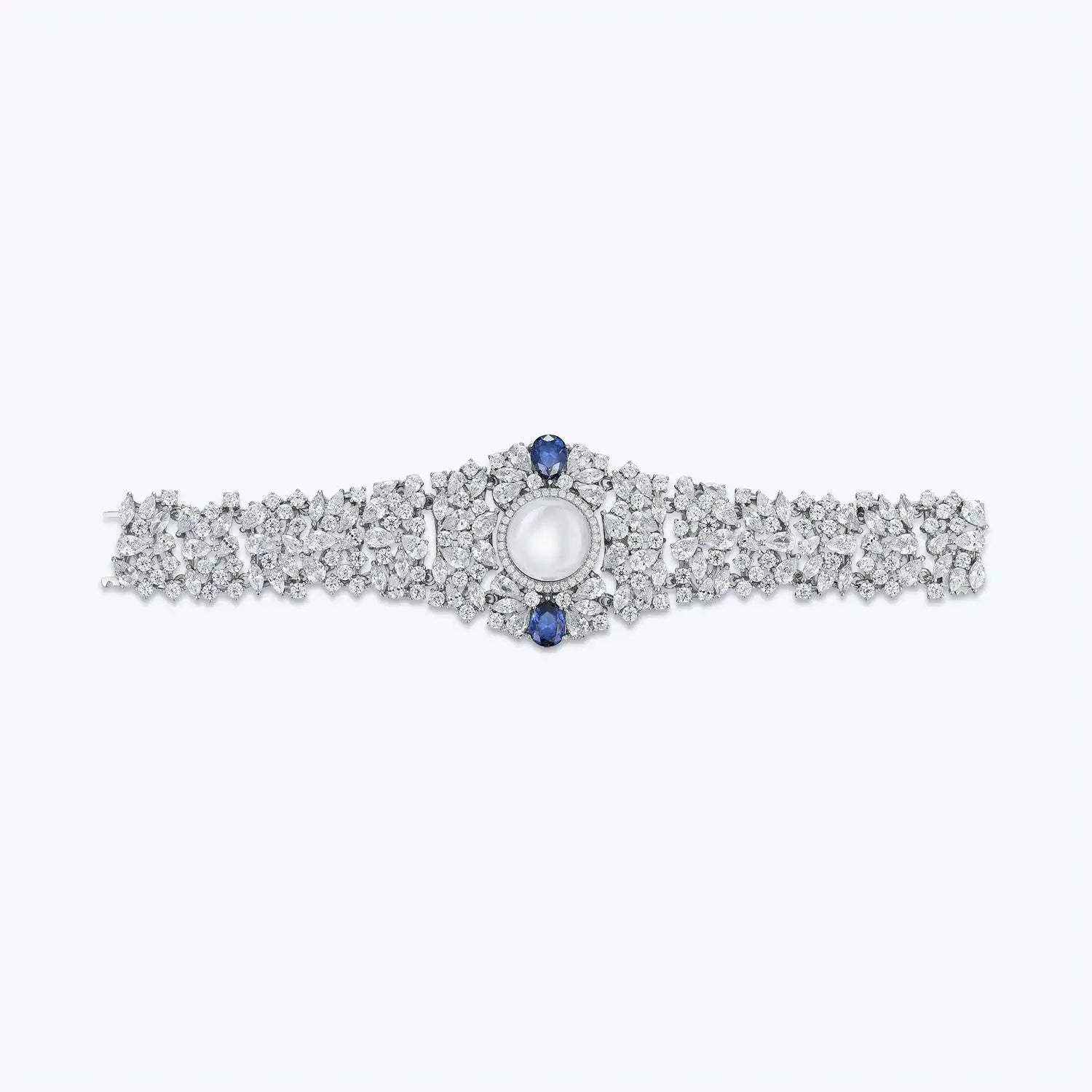 Luxury silver ring with pearl and sapphires, featuring wuha brand logo.