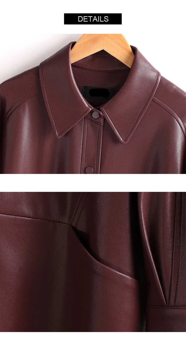 Brown leather jacket with a close-up of the collar and texture.