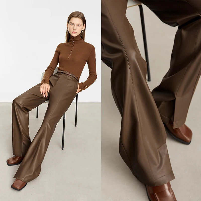 Person wearing black wide-leg pants and a white shirt on a gray background with 'Amii' branding.