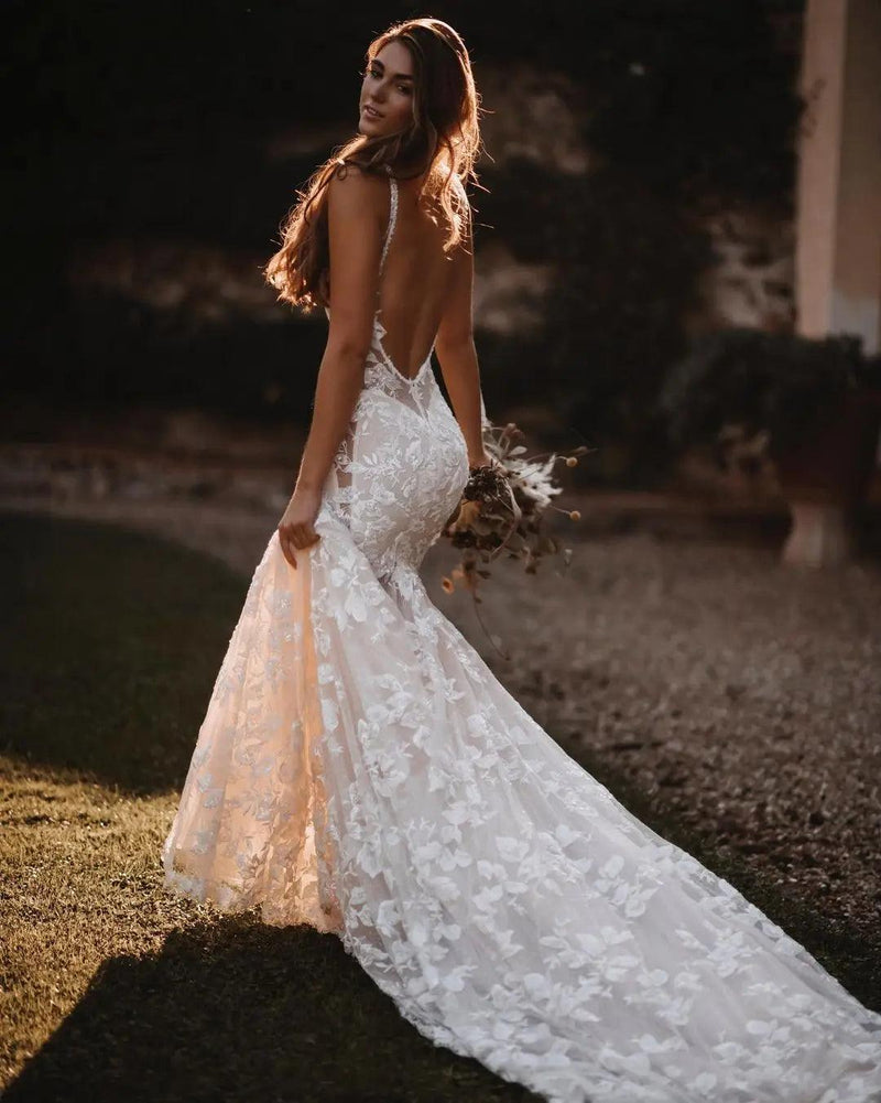 Boho Beach Wedding Dress - Enchanting Lace Mermaid with Spaghetti Straps, Backless Floral Appliques, and Glittering Tulle