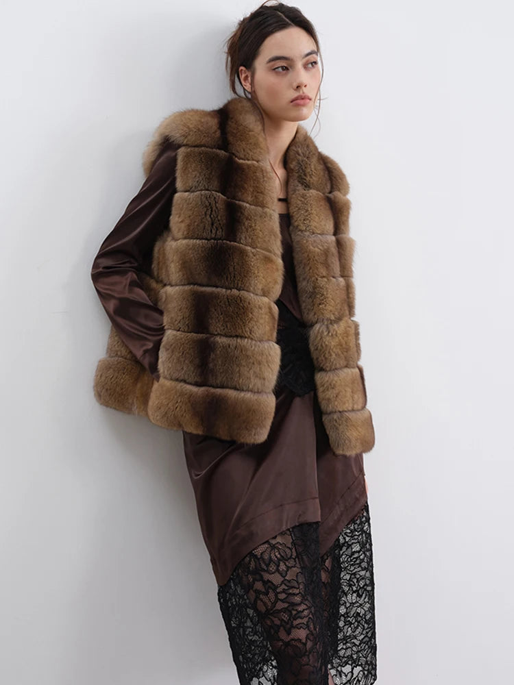 Woman wearing a brown fur vest over a dark dress with lace details on a white background - HER SHOP