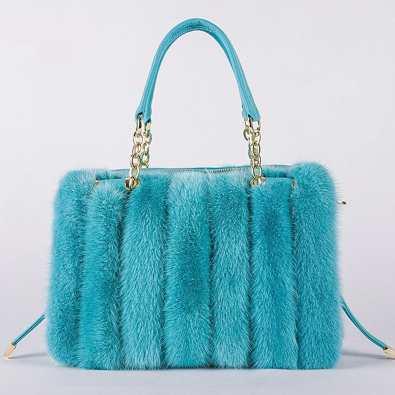 Turquoise fur handbag with gold chain handle on a light gray background, featuring the brand 'QIMING'. - HER SHOP