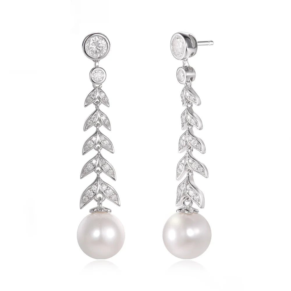 Silver earrings with pearls and crystals on a White background, featuring the brand 'TYL'. - HER SHOP