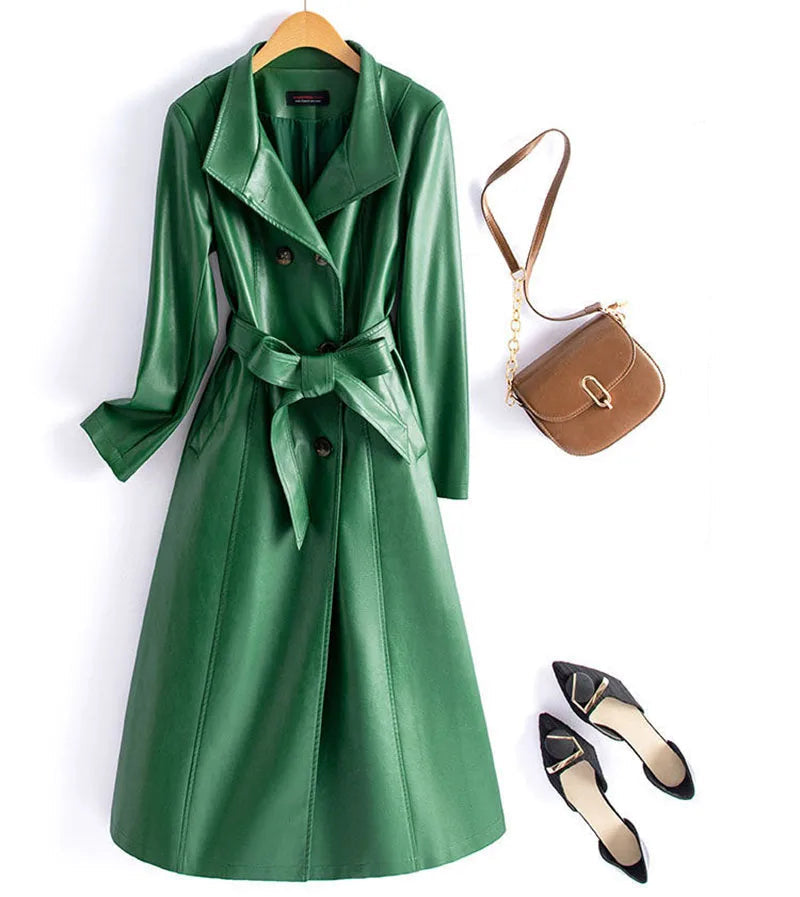 Green leather coat with a brown handbag and black shoes on a white background - HER SHOP